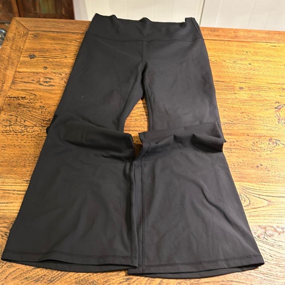 Never worn size medium Fabletics yoga pants boot cut